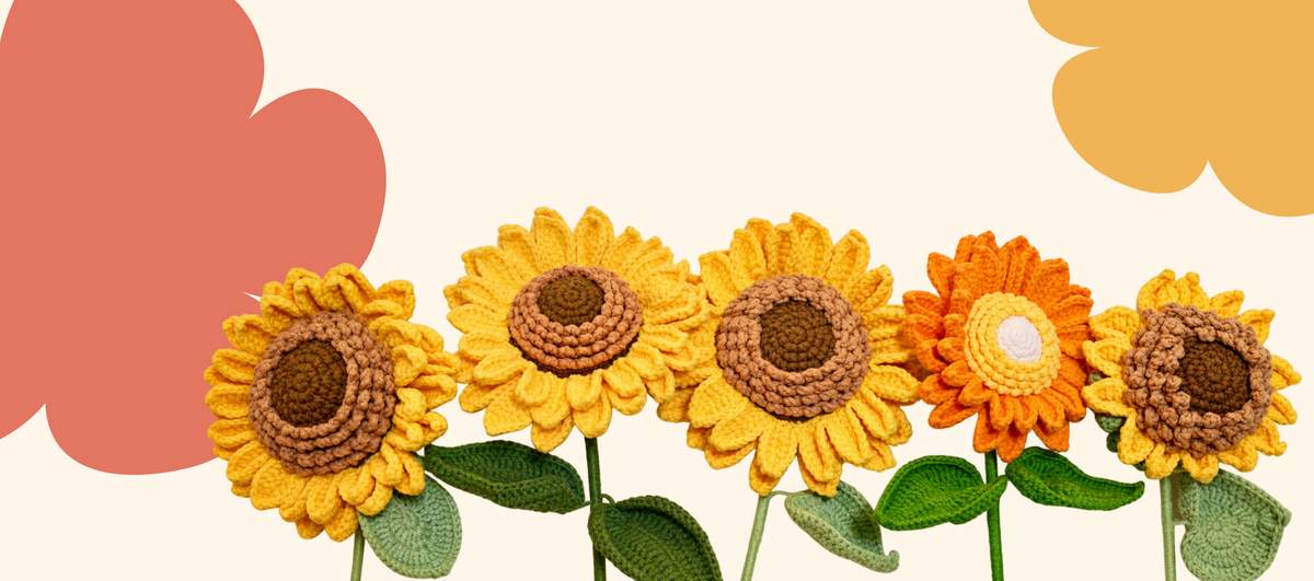 Five crochet sunflowers with green leaves on a cream background, framed by coral and golden flower artwork